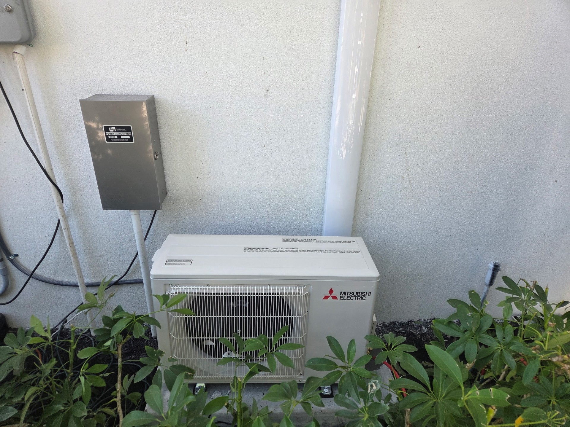 Mitsubishi mini-split outdoor condenser unit installed by AC Assurance